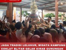 JAGA TRADISI LELUHUR, WISATA KAMPUNG COKLAT BLITAR GELAR KIRAB GUNUNGAN KETUPAT COKLAT