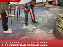 BUNGKUSAN PIL DOBEL L COBA DISELUNDUPKAN DENGAN CARA DILEMPAR KE LAPAS KELAS II B BLITAR